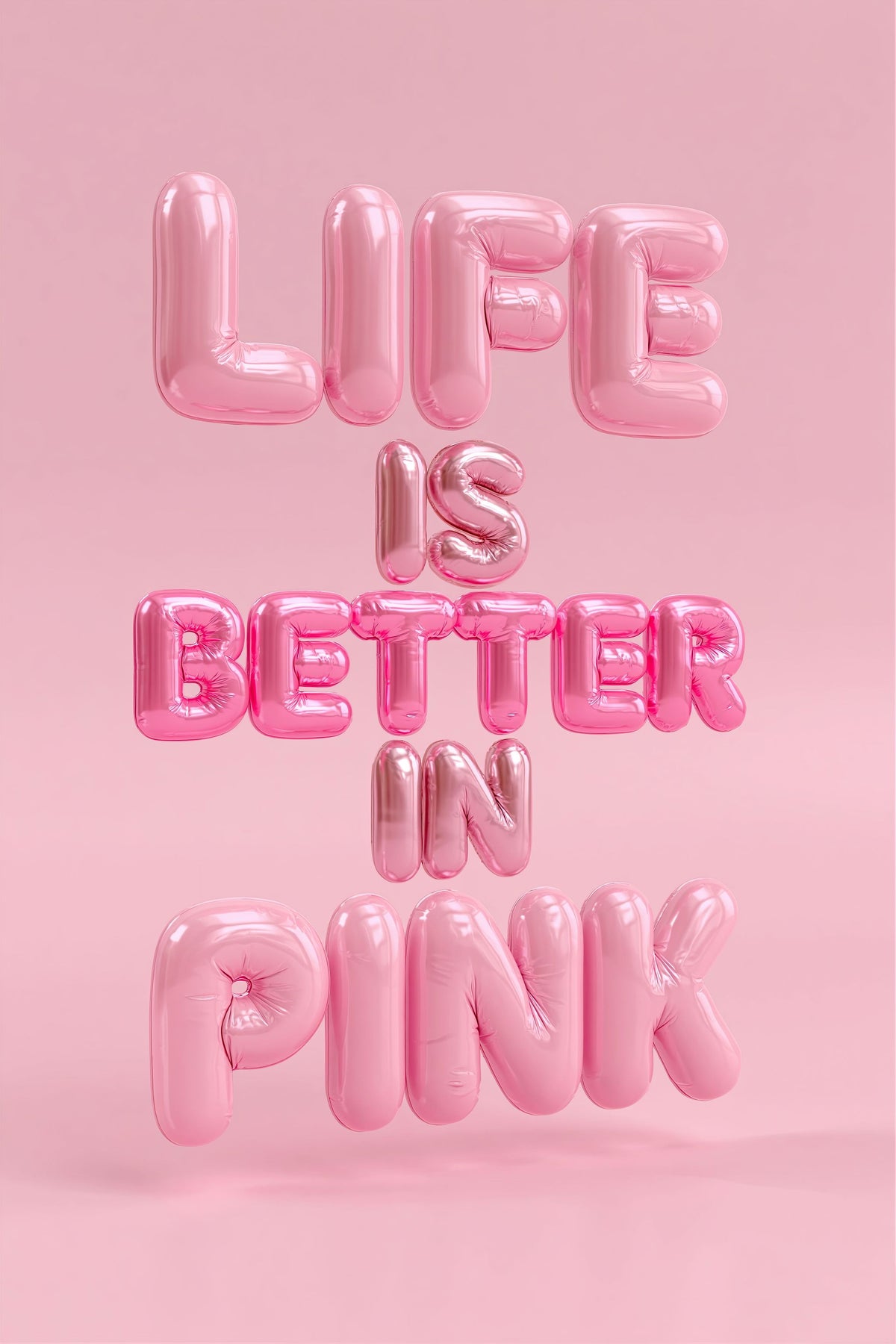 Wall art 3D metallic pink balloon-style letters spell out the phrase 'LIFE IS BETTER IN PINK' on a solid pink background/