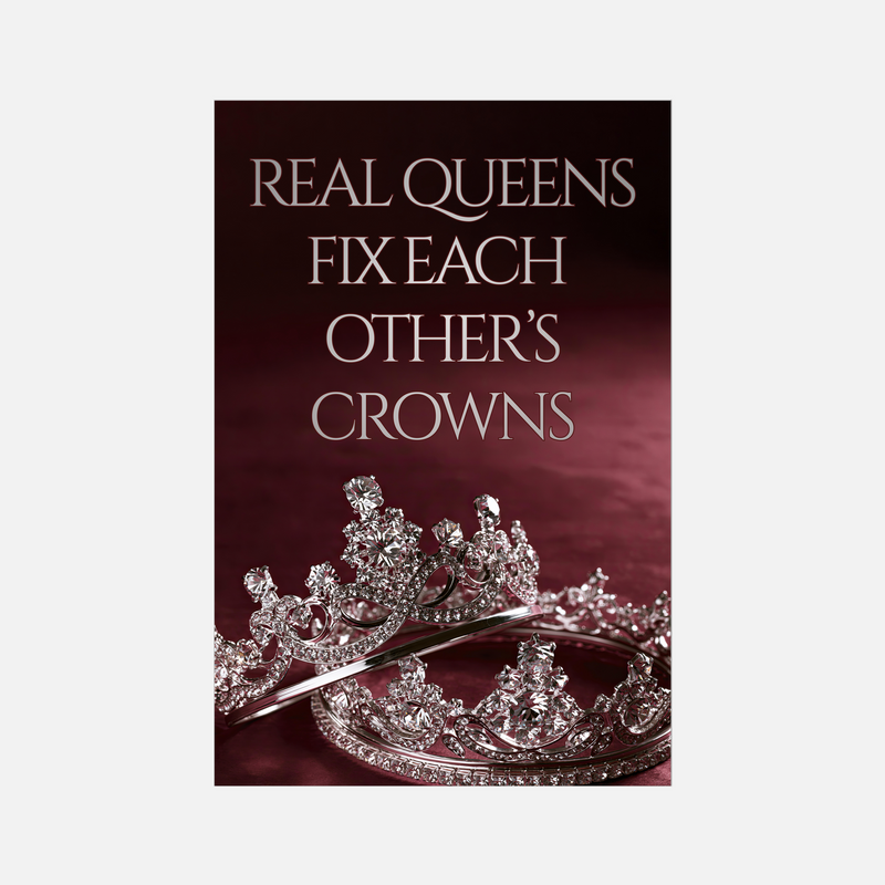 A poster-style product image with the title text 'REAL QUEENS FIX EACH OTHER'S CROWNS' in white serif lettering over a dark burgundy background, with two jeweled silver crowns at the bottom.