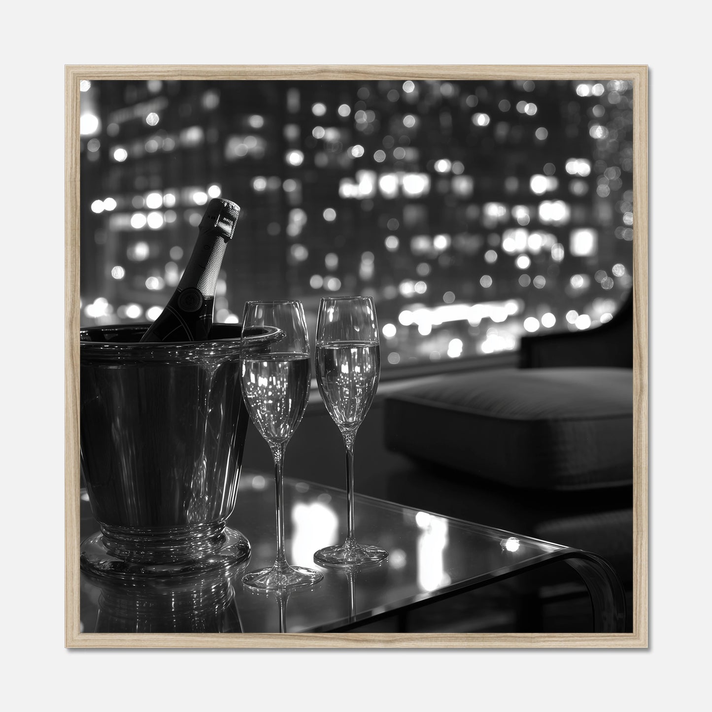 Natural oak framed wall art of two champagne glasses and a bottle in an ice bucket on a table with a cityscape in the background.