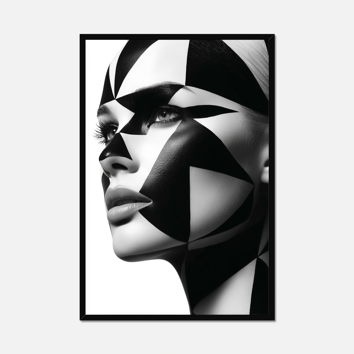 Black framed close-up portrait of a woman's face with dramatic black and white geometric face paint and makeup, shown against a plain white background.