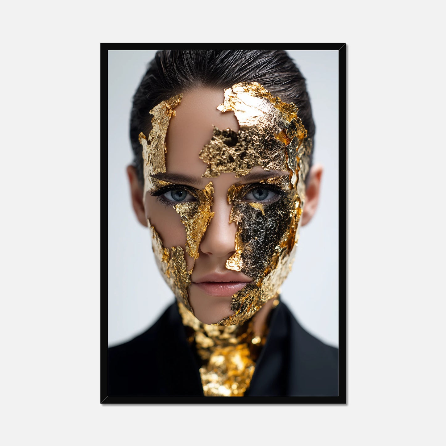 Black framed art of a female model wearing gold flake, big blue eyes and the best stare