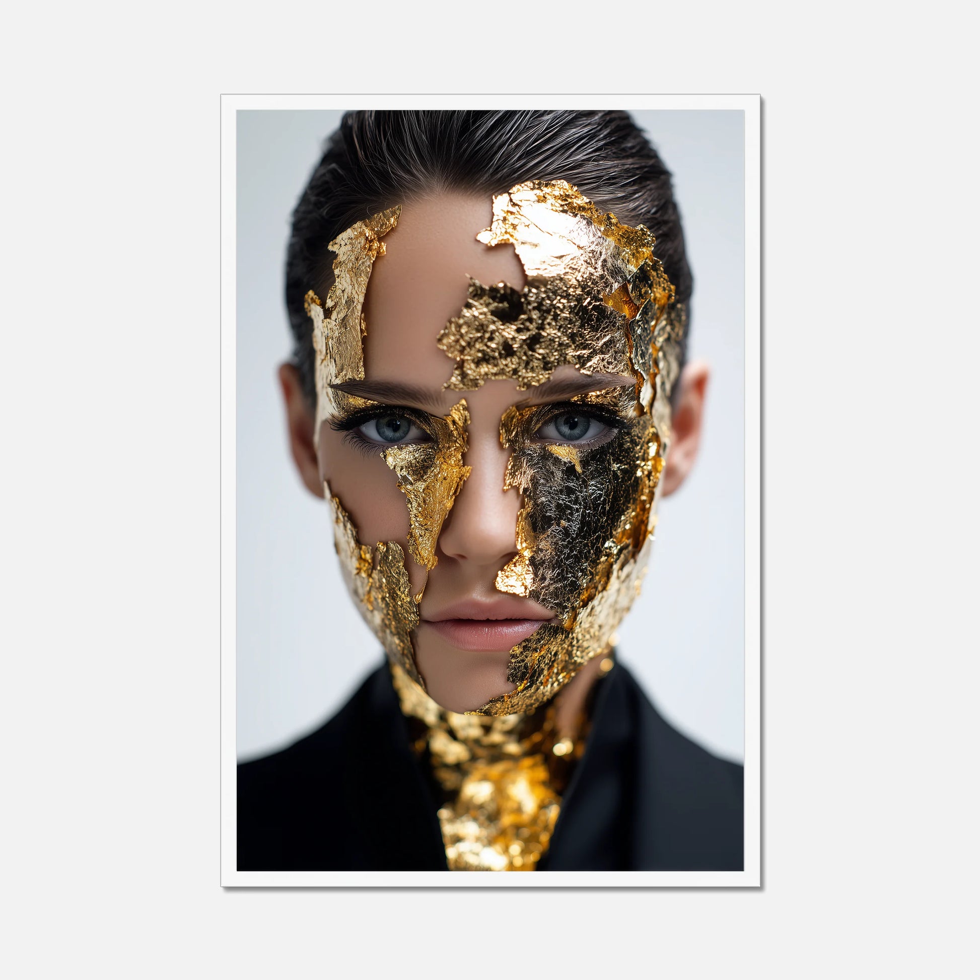 White framed art of a female model wearing gold flake, big blue eyes and the best stare