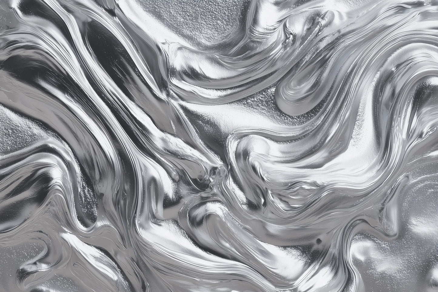 A close-up of a metallic silver surface with a fluid, marbled texture and reflective highlights.