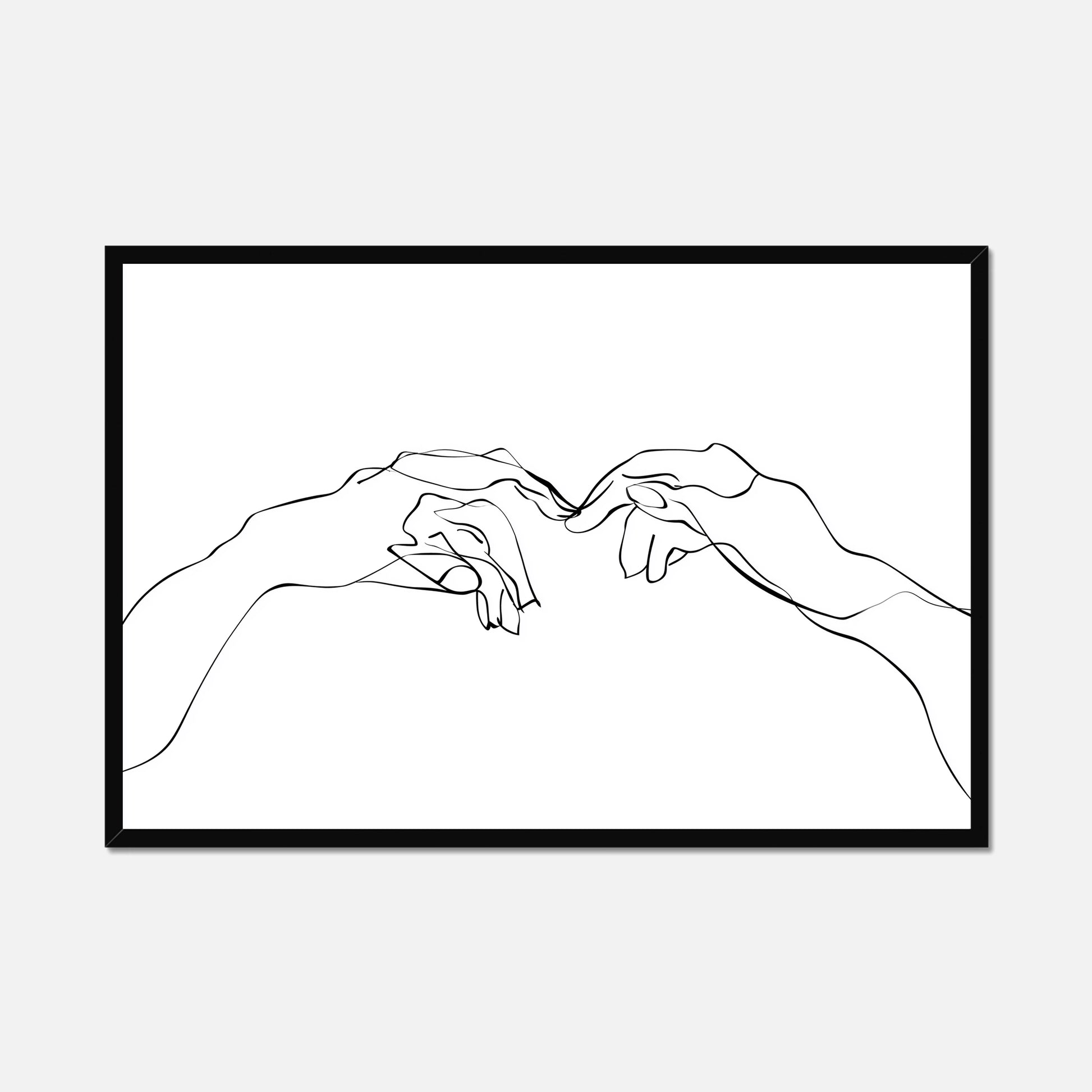 Black framed wall art of two hands near touching made from single lines on a white background