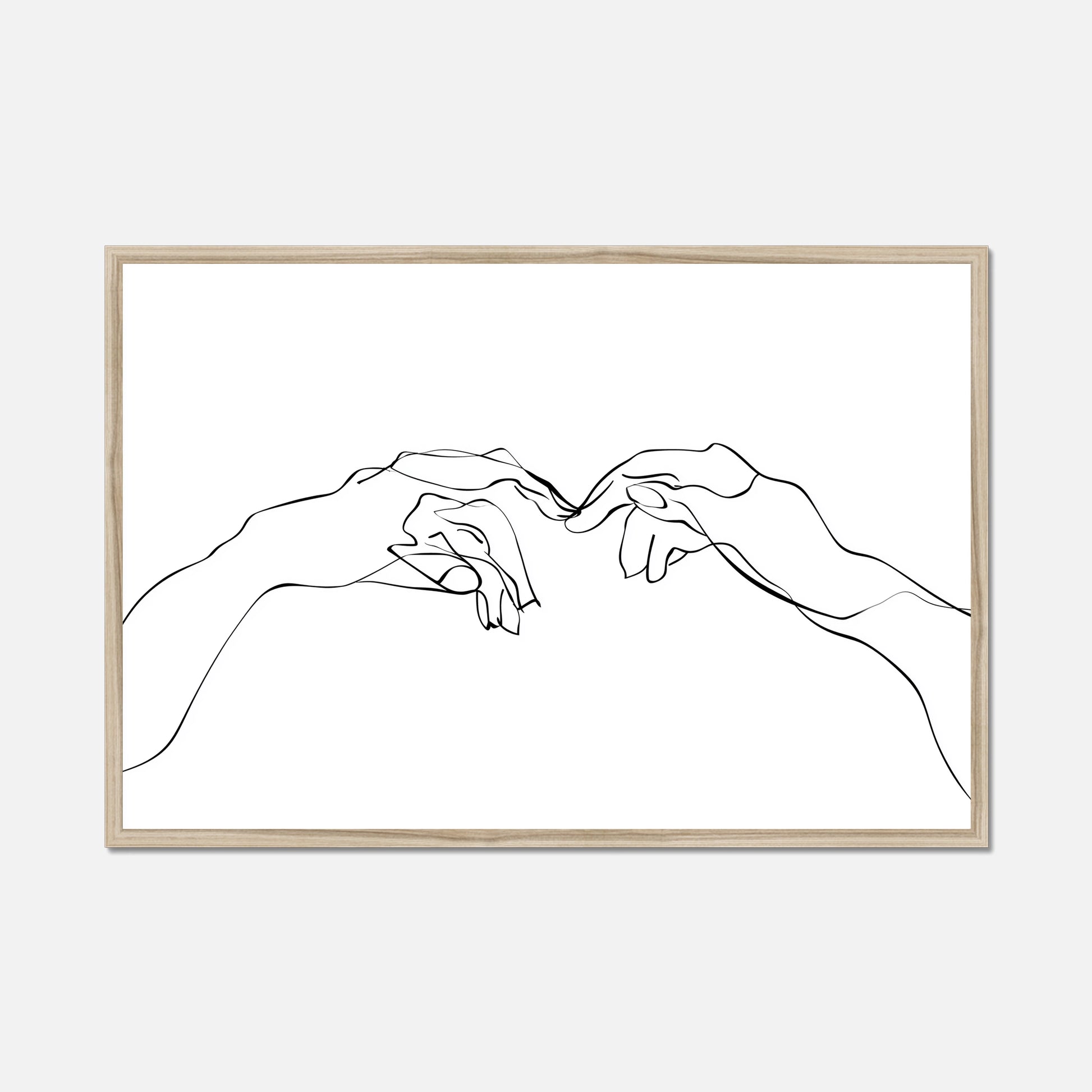 Natural oak framed wall art of two hands near touching made from single lines on a white background