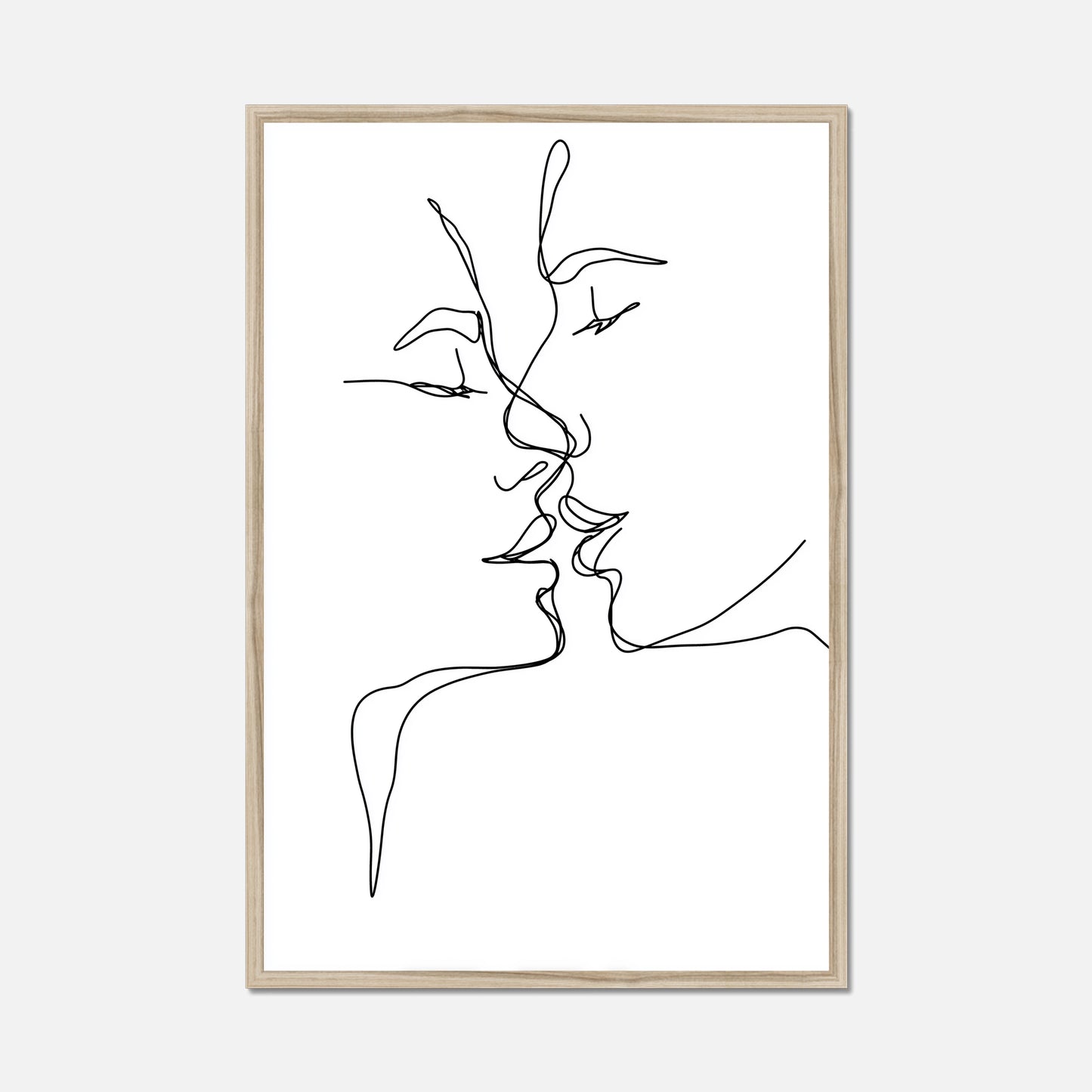 Black thin line art of two faces kissing in a natural oak frame