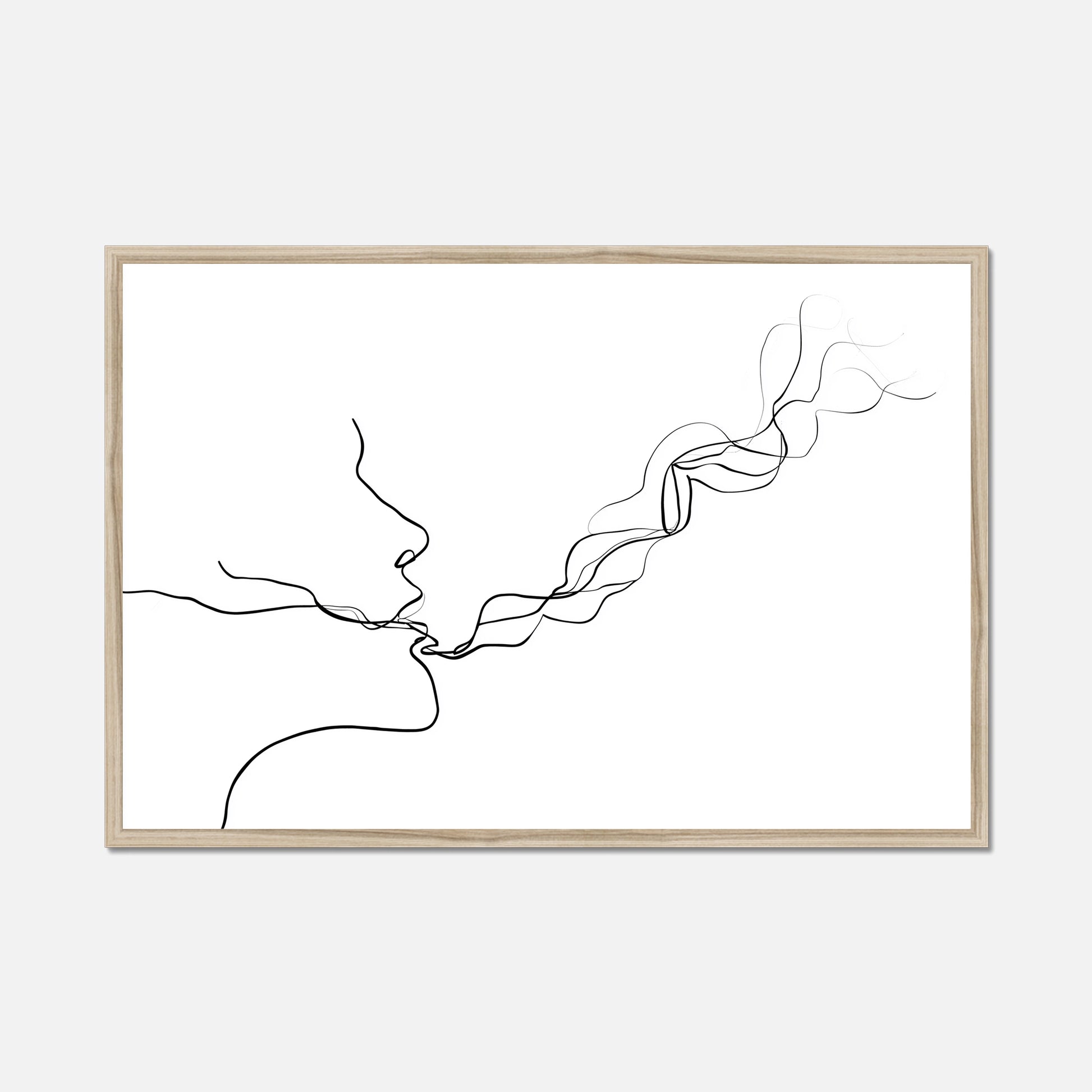 Framed line in a natural oak border art of two faces kissing on a white background 