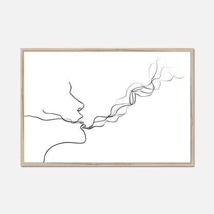 Framed line in a natural oak border art of two faces kissing on a white background 