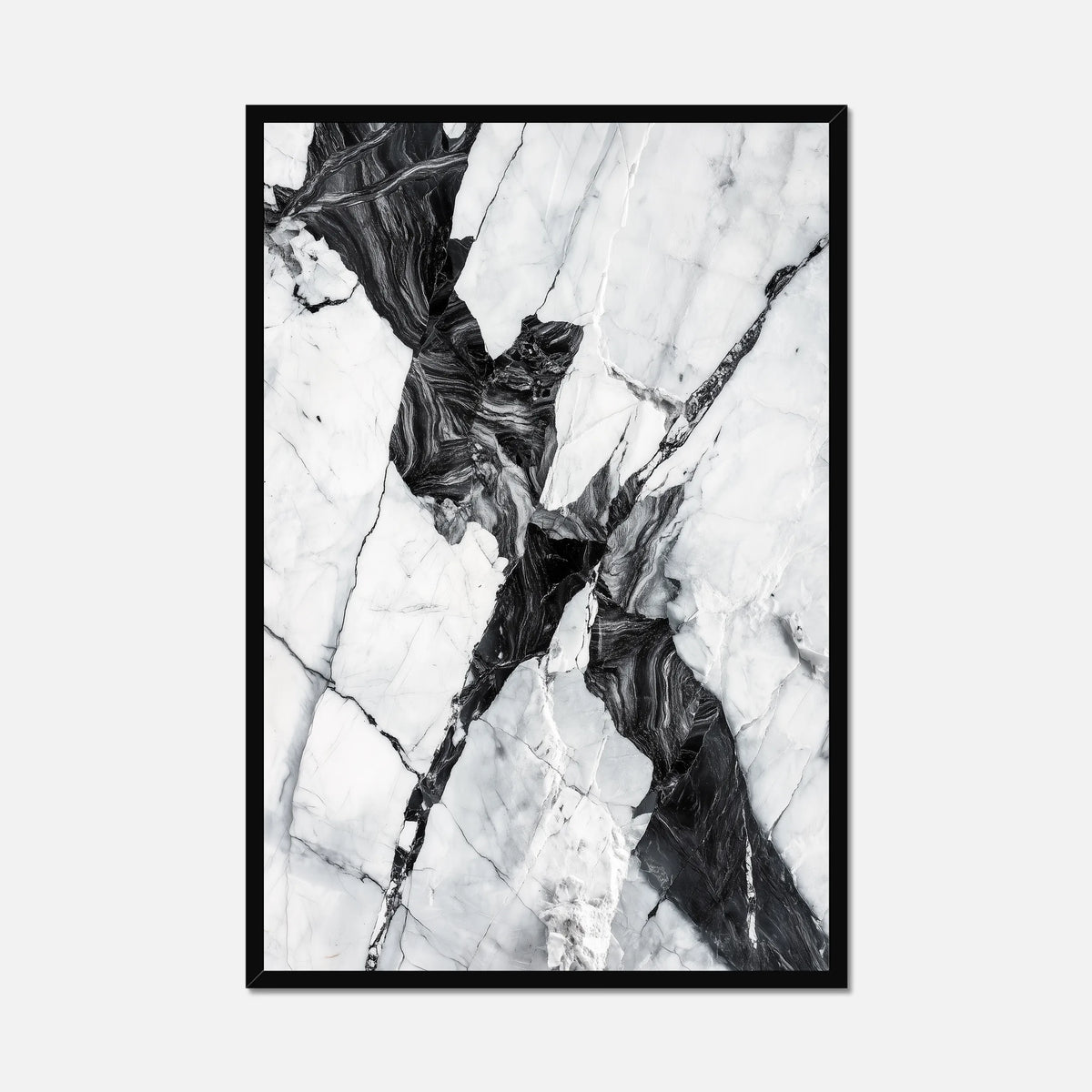 Black framed black and white marble wall art on a white background