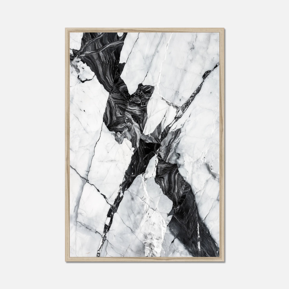 Natural oak framed black and white marble wall art on a white background