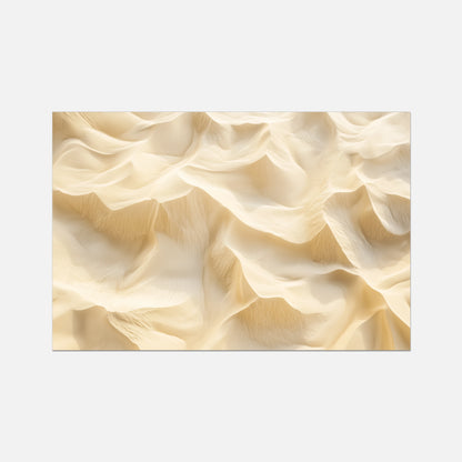 A rectangular wall art print featuring an abstract, textured design of flowing, layered ripples in warm cream and beige tones, shown against a solid light gray background.