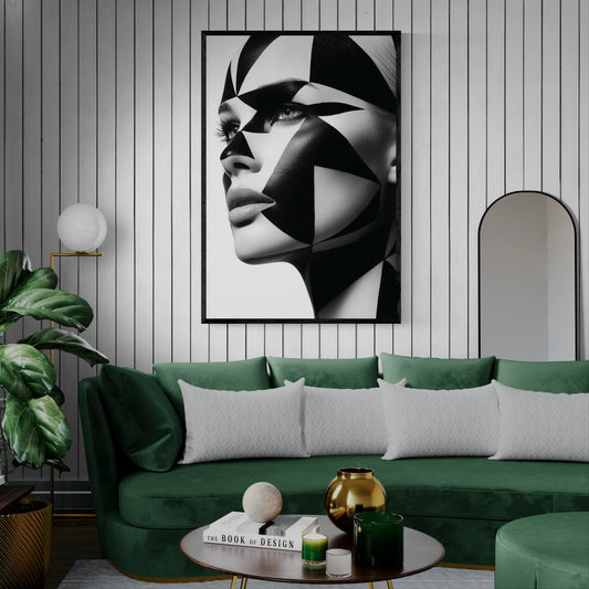 Modern living room with green sofa and white pin stripe wall. Black framed close-up portrait of a woman's face with dramatic black and white geometric face paint and makeup, shown against a plain white background.
