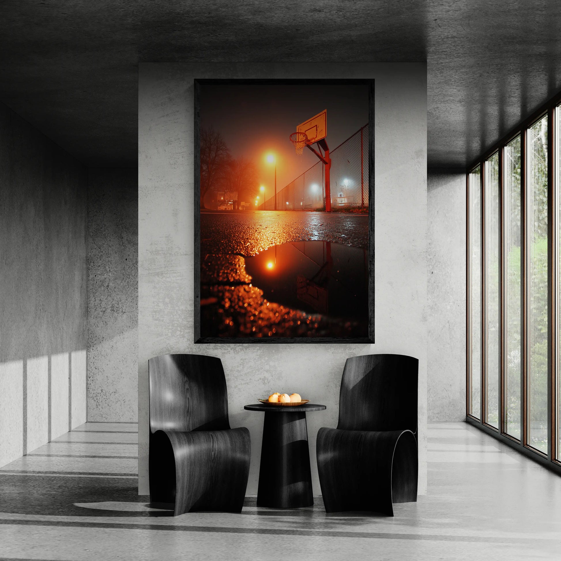 Modern interior with two chairs and a small table, featuring a large framed photograph of a basketball game at night.
