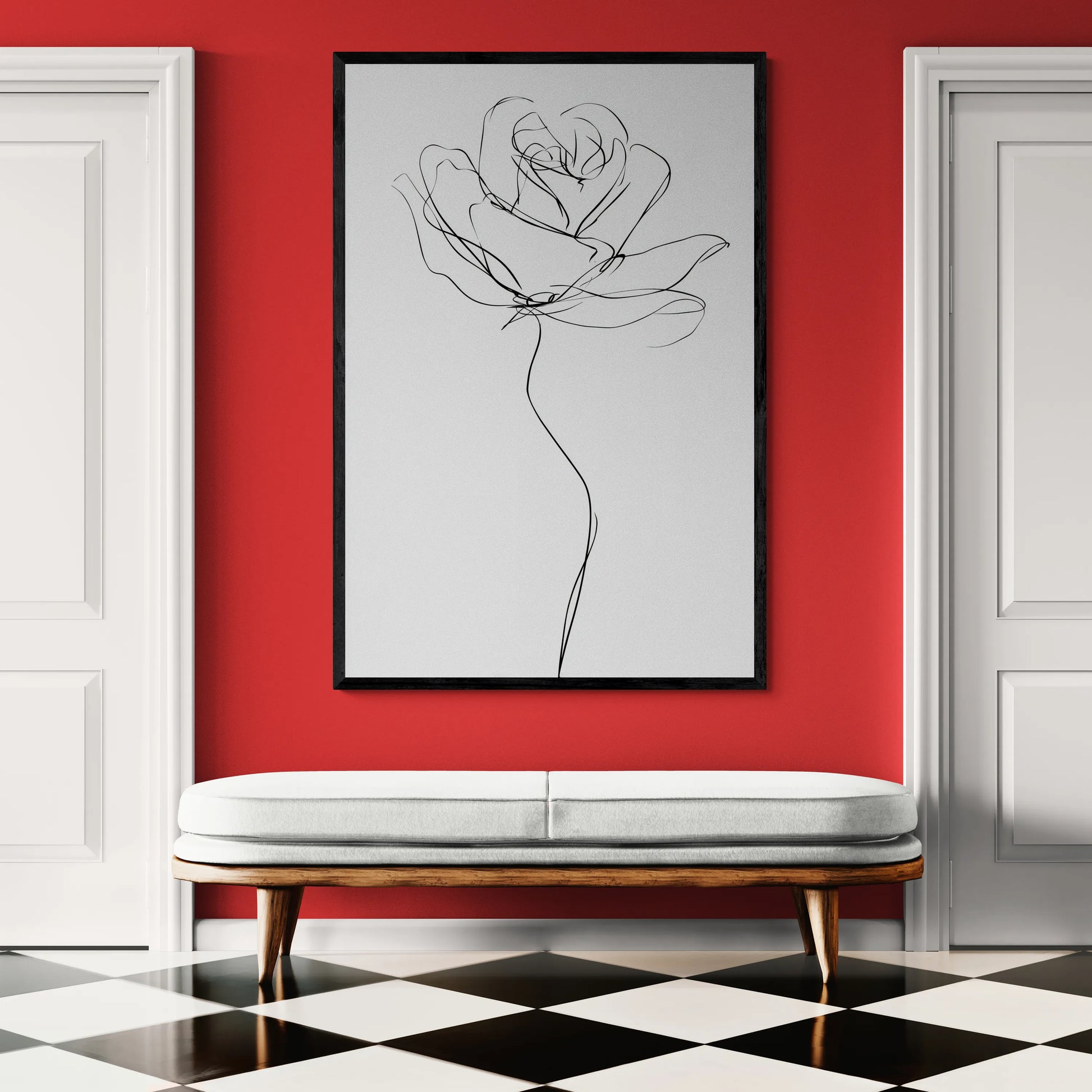 The best framed line art of a rose on a red wall with a white bench and black and white checkered floor.